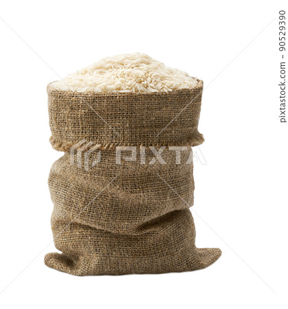 white rice basmati in sack isolated on white background. 90529390