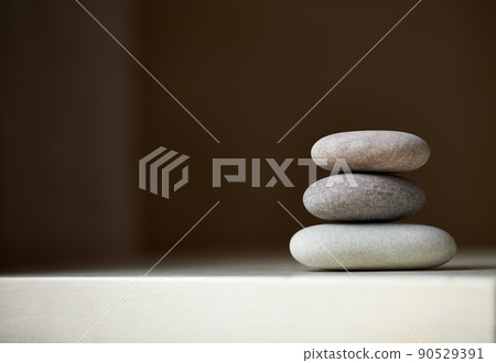 Find your balance. Three stones balanced on top of each other in natural light. Find your balance. Three stones balanced on top of each other in natural light. 90529391