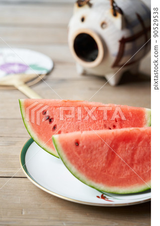 Watermelon placed on the porch 90529538