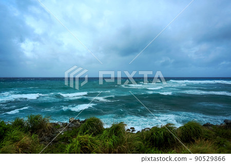 The sea of Okinawa that is raging violently due to a typhoon The sea of Okinawa that is raging violently due to a typhoon 90529866