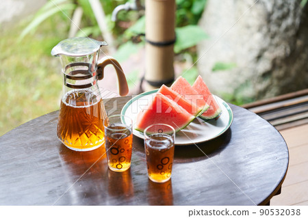 Barley tea and watermelon poured into a glass 90532038