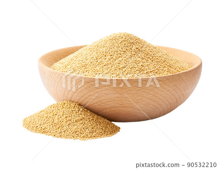 Organic amaranth in a wooden bowl isolated on white background. Organic amaranth in a wooden bowl isolated on white background. 90532210
