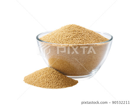 dry amaranth in a glass plate and scattered isolated on white background. 90532211