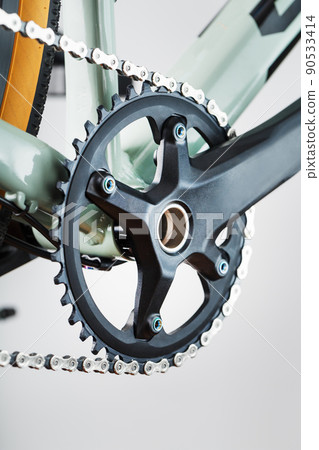 Bicycle crank system with chain close-up, mechanism for repair 90533414