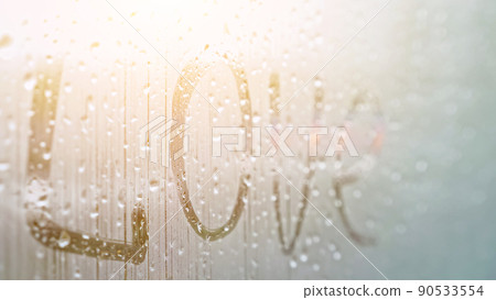 word Love on window covered with fog 90533554