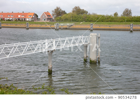 Modern metal jetty by the dutch sea 90534278