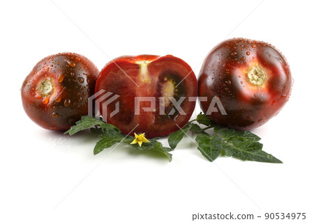 Two tomatoes and half on leaves Two tomatoes and half on leaves 90534975