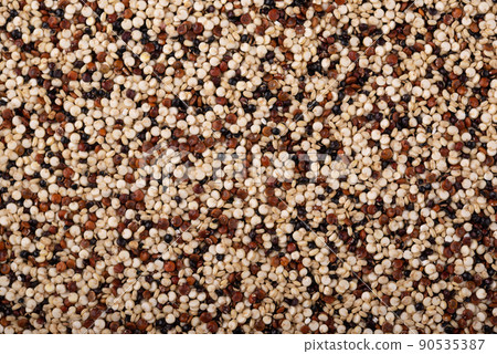 Red, white and brown quinoa. 90535387