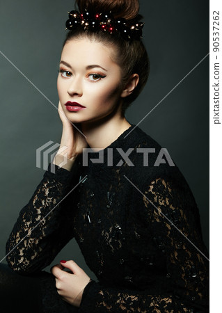 Photo of beautiful woman with magnificent hair. Perfect makeup 90537262