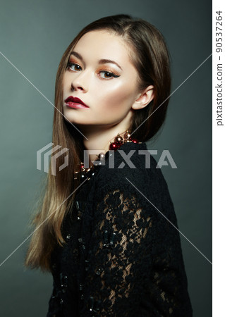 Photo of beautiful woman with magnificent hair. Perfect makeup Photo of beautiful woman with magnificent hair. Perfect makeup 90537264