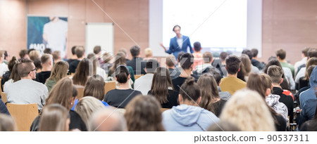 Business speaker giving a talk at business conference event. Business speaker giving a talk at business conference event. 90537311