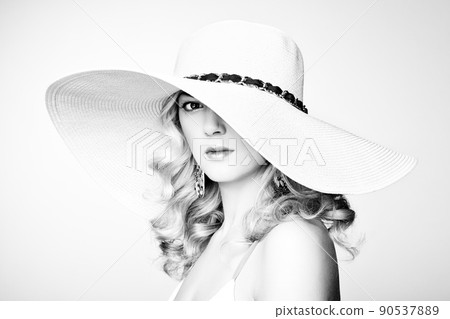 Fashion photo of young magnificent woman in hat. Girl posing 90537889