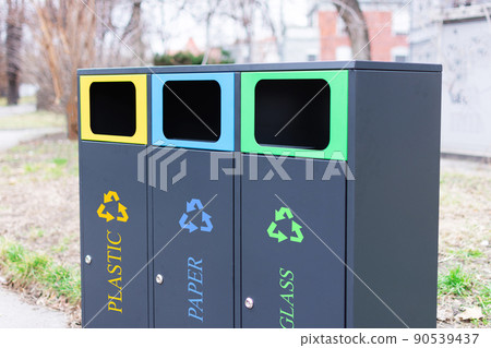 Modern colorful refuse bins for separate trash. 90539437