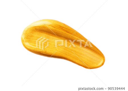 Abstract golden glitter beauty smear isolated on white background. Cosmetic or paint product. Abstract golden glitter beauty smear isolated on white background. Cosmetic or paint product. 90539444