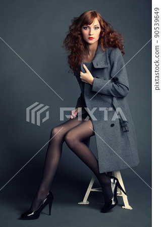 Portrait of young woman in autumn coat Portrait of young woman in autumn coat 90539649