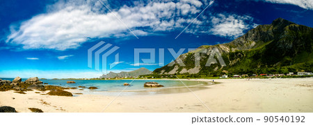 Panorama view to Jusnesvika bay and Rambergstranda beach, Flakst 90540192