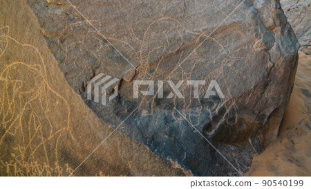 elephant and men- Cave paintings and petroglyphs at Boumediene ,Tassili nAjjer national park, Algeria elephant and men- Cave paintings and petroglyphs at Boumediene ,Tassili nAjjer national park, Algeria 90540199