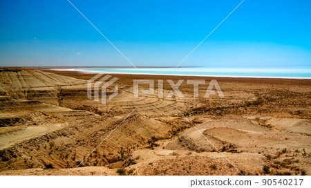 Panorama view to saline Barsa Kelmes lake and Ustyurt plateau in Karakalpakstan, Uzbekistan 90540217