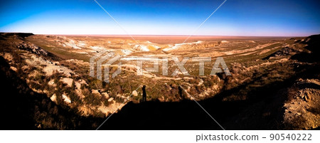 Panorama view to Aral sea from the rim of Plateau Ustyurt at sunset , Karakalpakstan, Uzbekistan 90540222