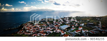 Aerial view to Vila do Corvo and Flores island at sunset, Corvo island, Azores, Portugal 90540235