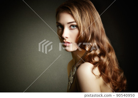 Beauty woman with long curly hair. Beautiful girl with elegant hairstyle 90540950