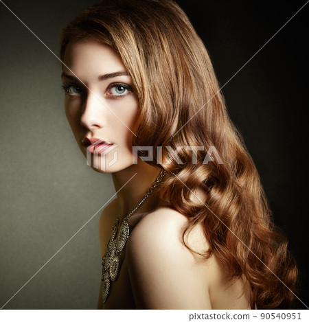Beauty woman with long curly hair. Beautiful girl with elegant hairstyle 90540951