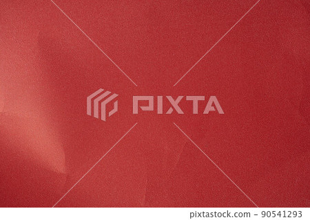 an empty wrinkled red pearl tissue paper textured background. text space for quotations 90541293