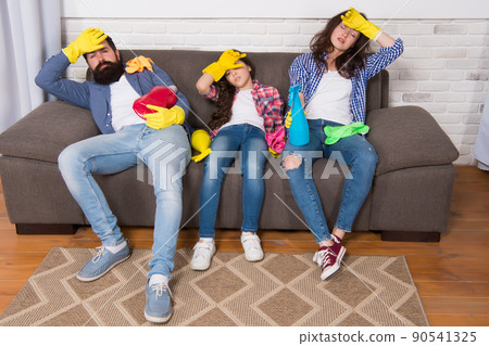 Cleaning all day exhausting occupation. Tired parents and kid. Cleaning all day exhausting occupation. Tired parents and kid. 90541325