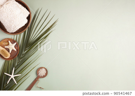 Spa composition with palm leaf, towel, sea salt and starfish Spa composition with palm leaf, towel, sea salt and starfish 90541467