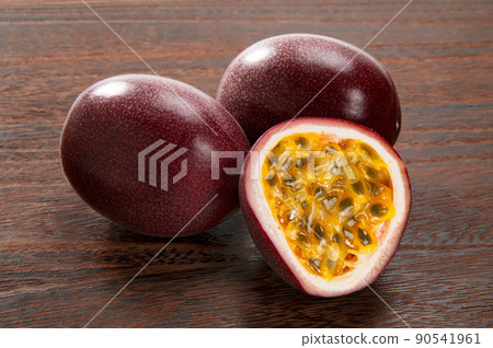 Tropical fruit passion fruit cut in half 90541961