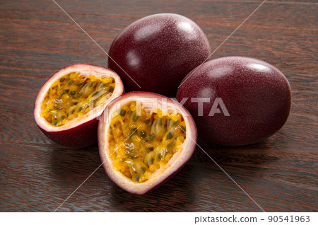 Tropical fruit passion fruit cut in half 90541963