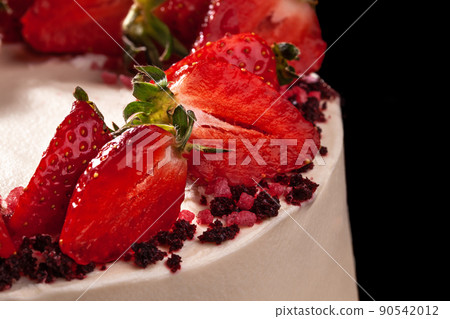 Cheesecake with strawberries. Cake decorated with strawberries. Delicious cheesecake decorated with fresh strawberries. Close-up Cheesecake with strawberries. Cake decorated with strawberries. Delicious cheesecake decorated with fresh strawberries. Close-up 90542012