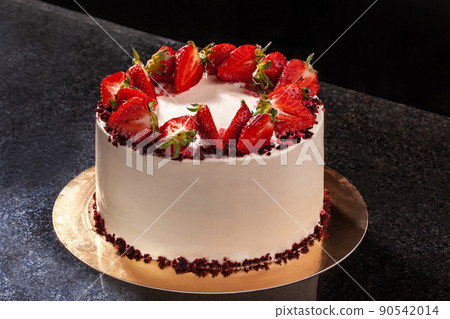 Cheesecake with strawberries. Cake decorated with strawberries. Delicious cheesecake decorated with fresh strawberries. Cheesecake with strawberries. Cake decorated with strawberries. Delicious cheesecake decorated with fresh strawberries. 90542014