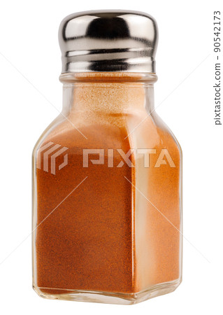 glass pepper pot with ground red paprika pepper isolated on white background 90542173