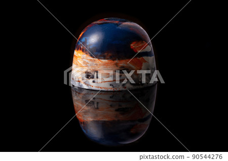 Red, blue and white colored luxury handmade chocolate candy on black background. Product concept for chocolatier Red, blue and white colored luxury handmade chocolate candy on black background. Product concept for chocolatier 90544276