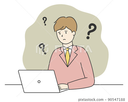 A man in a suit thinking in front of a computer 90547188