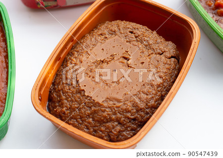 Korean chili paste on white background. Korean chili paste on white background. 90547439