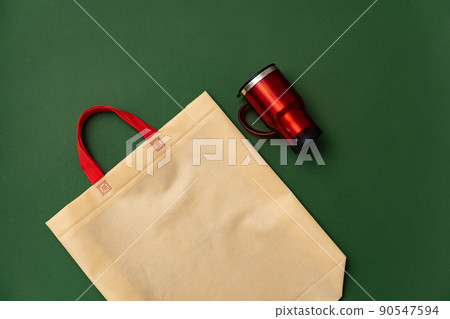Textile shopping bag and coffee cup flat lay Textile shopping bag and coffee cup flat lay 90547594
