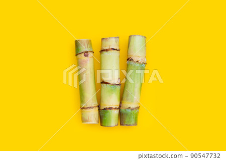 Sugar cane on white background. Sugar cane on white background. 90547732