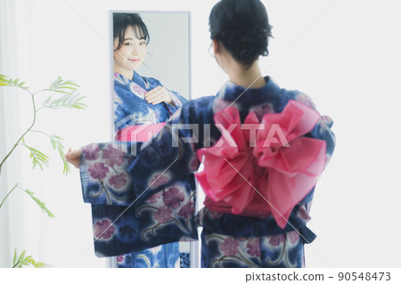 A woman in a yukata A woman in a yukata 90548473