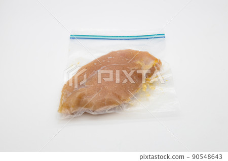 Vacuum-packed chicken breast chicken in a freezer bag 90548643