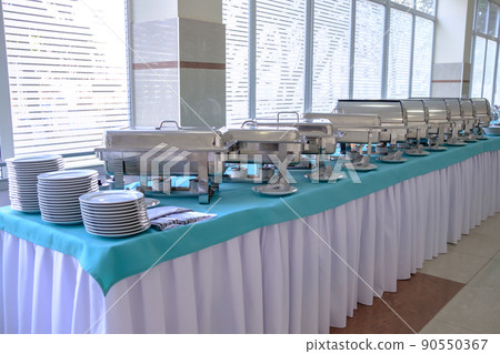 kitchen equipment on the table for a gourmet banquet or other service event. 90550367