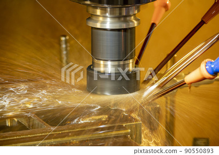 The CNC milling machine cutting the  mold parts with oil coolant method. 90550893