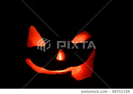 Kind Halloween Pumpkin On A Black Background Kind Halloween Pumpkin On A Black Background 90552189