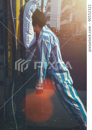 Portrait of a young man sleeping outside with sleepwalking Portrait of a young man sleeping outside with sleepwalking 90552321