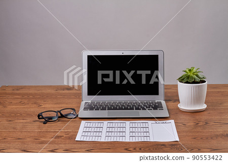 Business image of schedule book with glasses and laptop computer. Business image of schedule book with glasses and laptop computer. 90553422