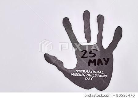 Hand silhouette and concept of 25 may international missing childrens day. Hand silhouette and concept of 25 may international missing childrens day. 90553470