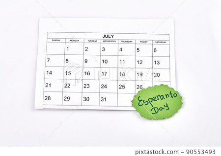 Paper july calendar and esperanto day message. 90553493