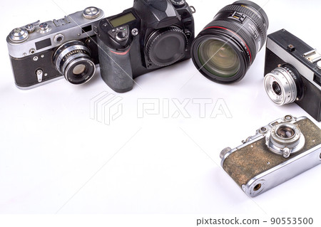 Old vintage retro photo cameras and copy space. Old vintage retro photo cameras and copy space. 90553500