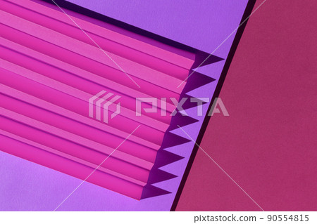 Abstract pink and purple colored paper texture. Folded paper with harsh sun shadows. Minimalist background. Abstract pink and purple colored paper texture. Folded paper with harsh sun shadows. Minimalist background. 90554815